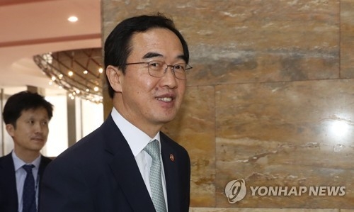 This photo, taken May 24, 2018, shows Unification Minister Cho Myoung-gyon arriving at the National Assembly in Seoul to attend a parliamentary session. (Yonhap)