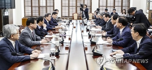 In this photo provided by Seoul's presidential office Cheong Wa Dae, President Moon Jae-in (fourth from L) speaks during a plenary meeting of the National Security Council at Cheong Wa Dae on June 14, 2018. (Yonhap)