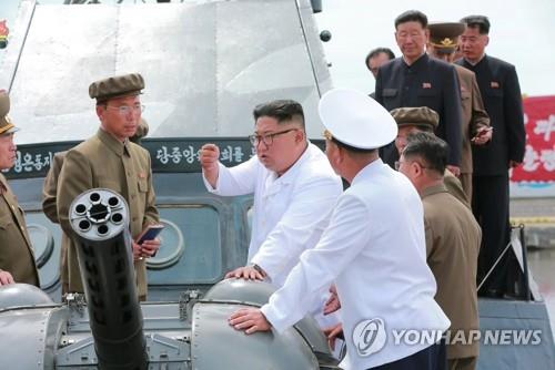 North Korean leader Kim Jong-un inspects a shipyard in Chongjin, North Hamkyong Province, in this footage aired by North Korea's Korean Central TV Broadcasting Station on July 17, 2018. (For Use Only in the Republic of Korea. No Redistribution) (Yonhap)