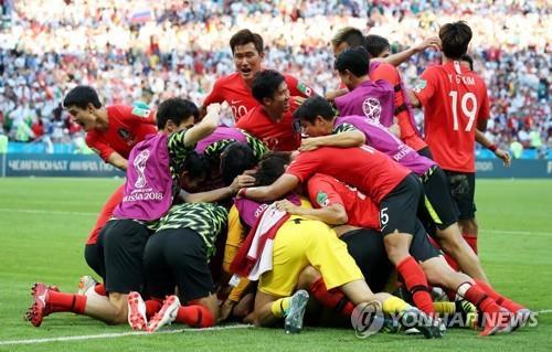 In this file photo from June 28, 2018, members of the South Korean men's nationall football team celebrate a goal by Son Heung-min against Germany in their Group F match during the 2018 FIFA World Cup at Kazan Arena in Kazan, Russia. (Yonhap)