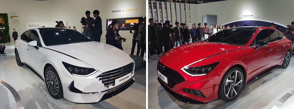 These photos, taken on March 28, 2019, show Hyundai's Sonata gasoline hybrid model (L) and 1.6 gasoline turbo model displayed during media day at the 2019 Seoul Motor Show, which lasts through April 7. (Yonhap)