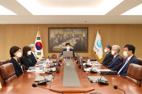 This photo, provided by the Bank of Korea (BOK), shows the seven members of the BOK monetary policy board, which voted on July 16, 2020, to keep the policy rate frozen at 0.5 percent. (Yonhap)