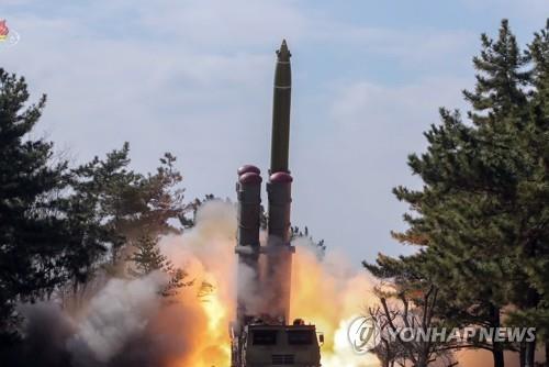 This image, aired by the North's Korean Central Television on March 3, 2020, shows what it said is a long-range artillery drill conducted the previous day. North Korea said leader Kim Jong-un inspected the drill, which South Korea said is presumed to have been a short-range ballistic missile test. (For Use Only in the Republic of Korea. No Redistribution) (Yonhap)