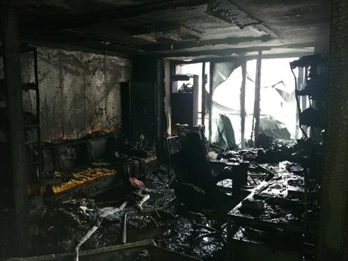 This photo, provided by the Busan Metropolitan Police Agency, shows the scene of a fire that broke out at an apartment building in the southeastern port city of Busan on Nov. 24, 2020. (PHOTO NOT FOR SALE) (Yonhap)