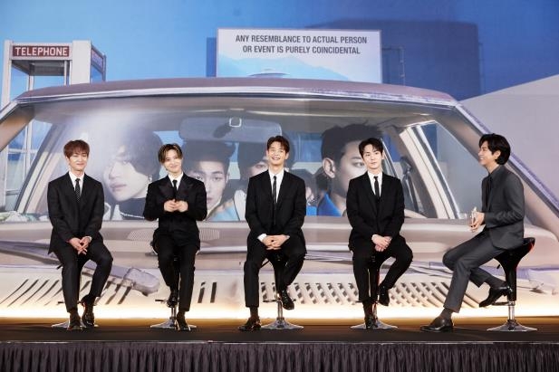 This photo, provided by SM Entertainment on Feb. 22, 2021, shows K-pop boy band SHINee during an online press conference that was emceed by singer U-know Yunho (R). (PHOTO NOT FOR SALE)(Yonhap)