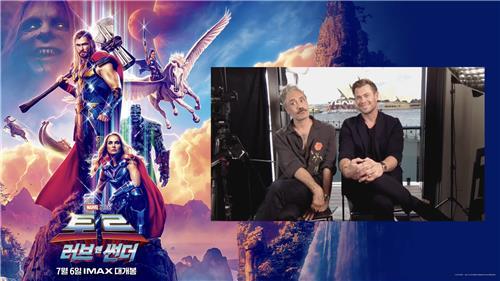 This image provided by Walt Disney Company Korea shows director Taika Waititi (L) and actor Chris Hemsworth of "Thor: Love and Thunder" attending an online press conference with Korean media on June 27, 2022. (PHOTO NOT FOR SALE) (Yonhap)