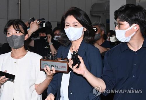 This file photo taken Aug. 23, 2022, shows Kim Hye-kyung, the wife of Democratic Party Chairman Lee Jae-myung, leaving the Gyeonggi Nambu Provincial Police Agency in Suwon, south of Seoul, after about five hours of questioning about her corporate card allegations. (Pool photo) (Yonhap)