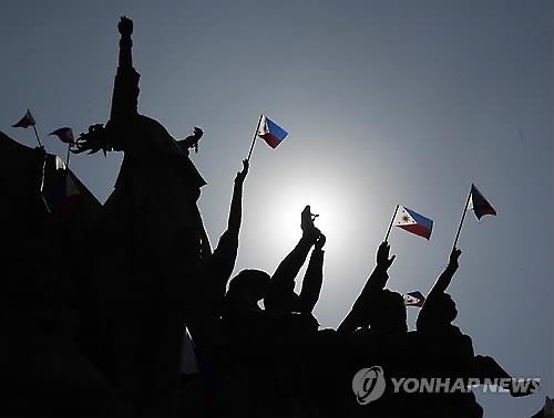 "혁명 안 끝났다, 독재청산 진행형" 필리핀 '피플파워' 30주년 - 2