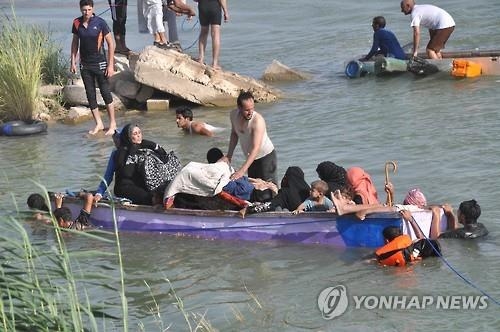 "IS, 팔루자 탈출 민간인 사살·성노예 거부 여성 화형" - 2