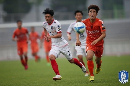 지난 7월 포천 시민축구단과 청주시티 FC의 경기 장면 (대한축구협회=연합뉴스)