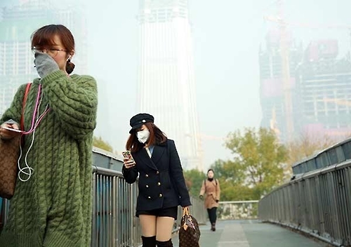 베이징 도심의 스모그 출처:차이나데일리