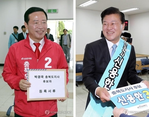 충북지사 선거에 출마한 자유한국당 박경국 후보(왼쪽)와 바른미래당 신용한 후보.