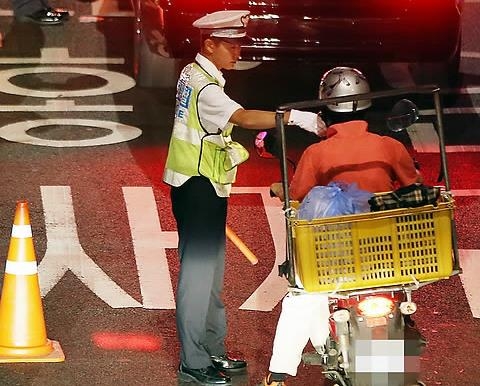 시동 끈 오토바이 내리막길 주행…법원 "음주운전 아니다" - 1