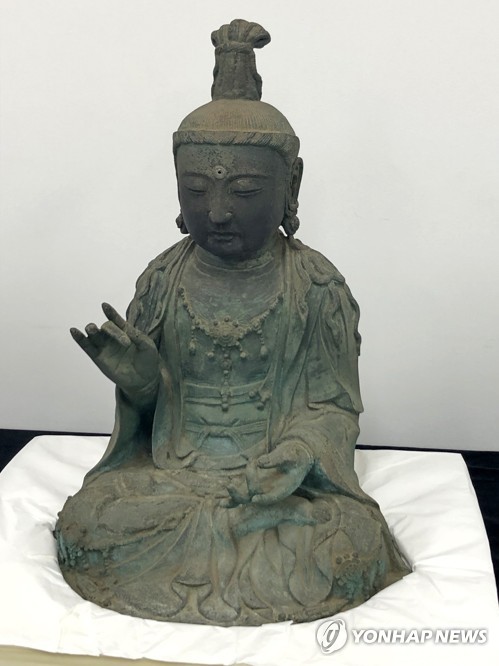 제자리 찾기 재판 대상인 금동관음보살좌상