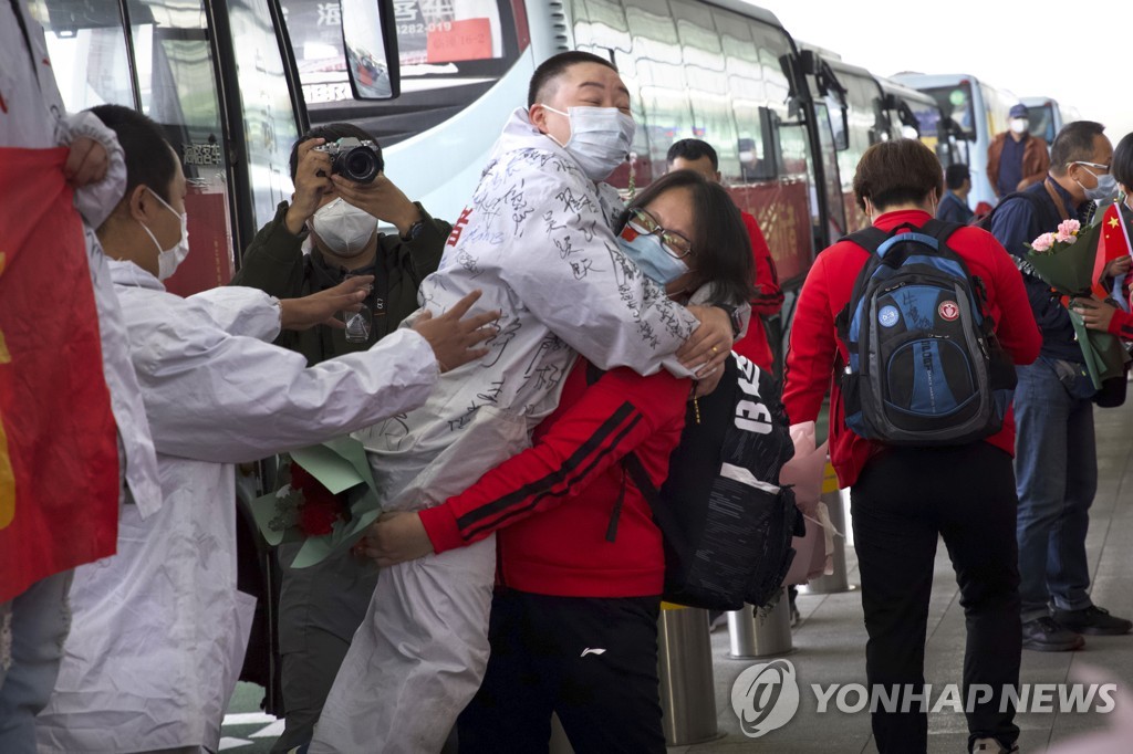 APTOPIX Virus Outbreak China Lockdown Lifted