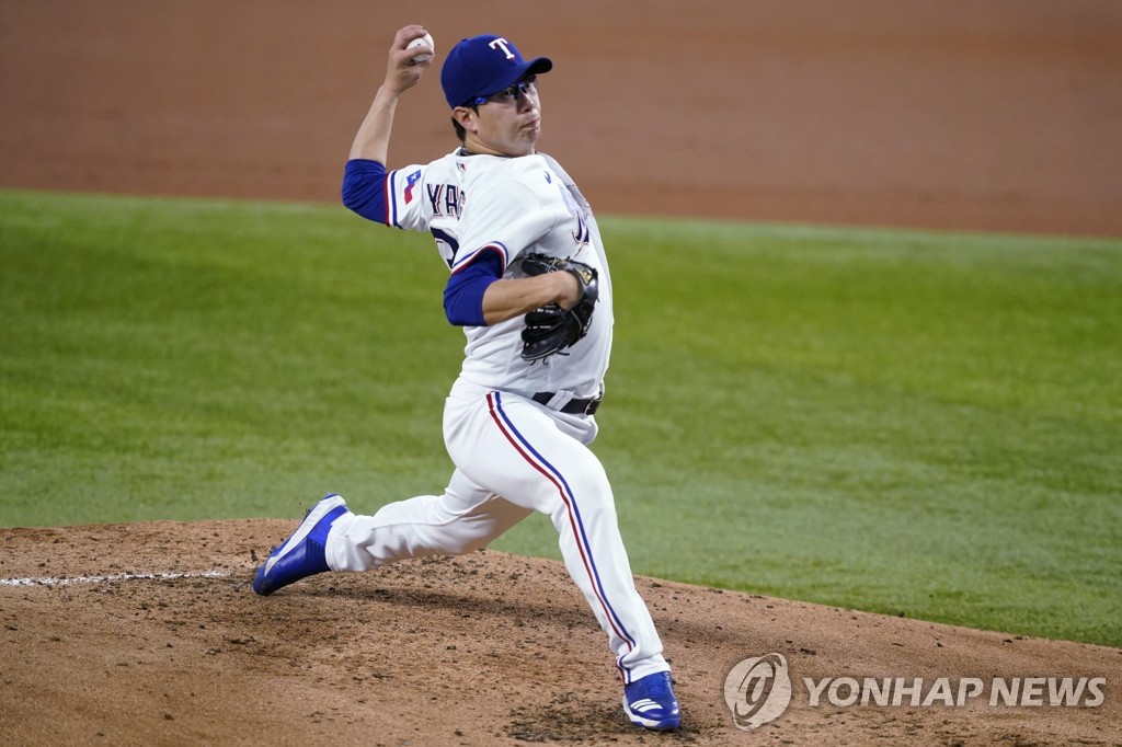 In this Associated Press photo, Yang Hyeon-jong of the Texas Rangers pitches against the New York Yankees in the top of the third inning of a Major League Baseball regular season game at Globe Life Field in Arlington, Texas, on May 19, 2021. (Yonhap)