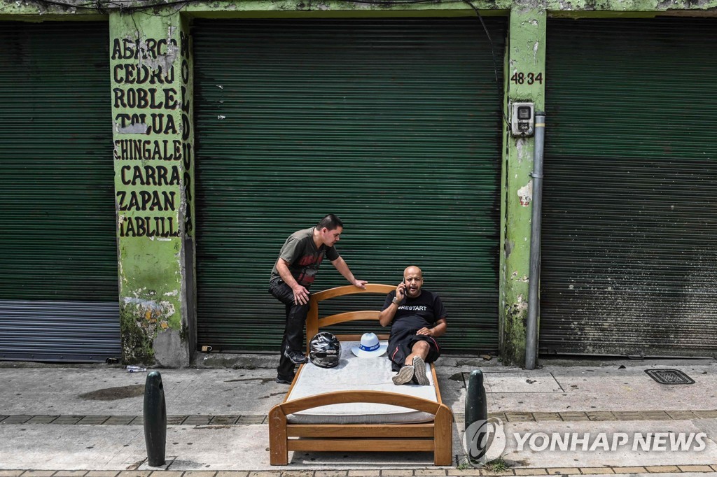 COLOMBIA-SOCIAL-SLOTH-DAY