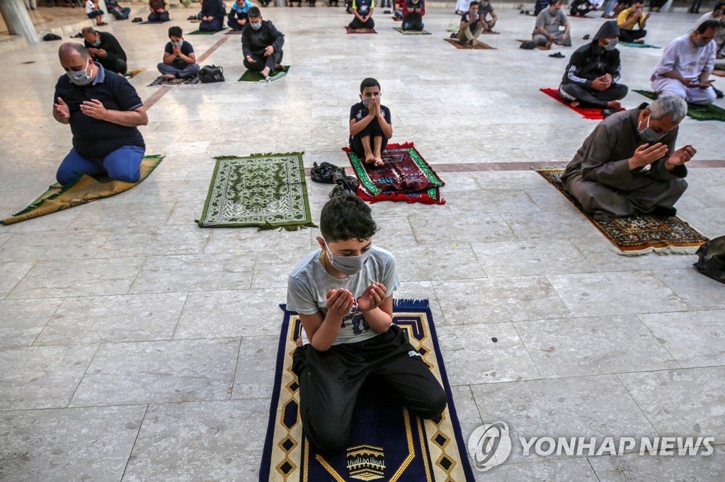 MIDEAST ISRAEL PALESTINIAN CORONAVIRUS EID AL-FITR