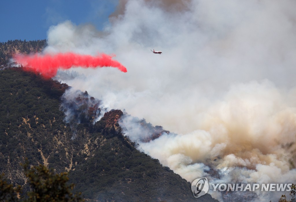 USA CALIFORNIA WILDFIRE APPLE FIRE