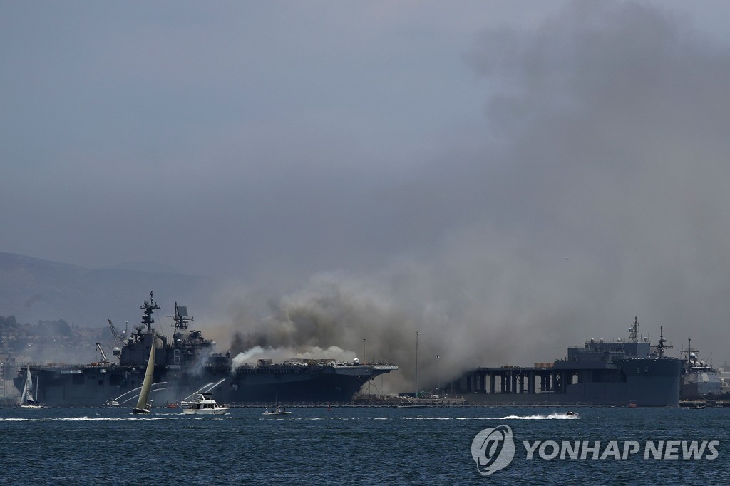 US-NAVY-SHIP-USS-BONHOMME-RICHARD-BURNS-AT-NAVAL-BASE-IN-SAN-DIE