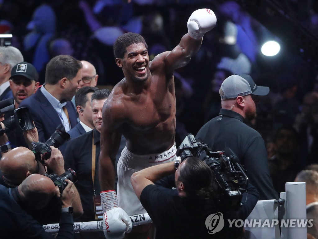 British boxer Anthony Joshua wins back his world heavyweight titles in Saudi Arabia
