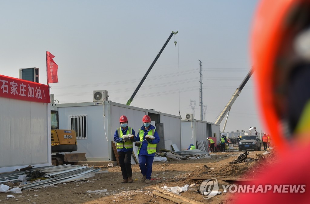 CHINA-HEBEI-SHIJIAZHUANG-COVID-19-CONSTRUCTION-FATHER-SON(CN)