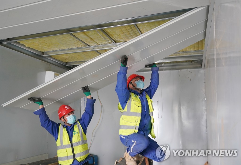 CHINA-HEBEI-SHIJIAZHUANG-COVID-19-CONSTRUCTION-FATHER-SON(CN)