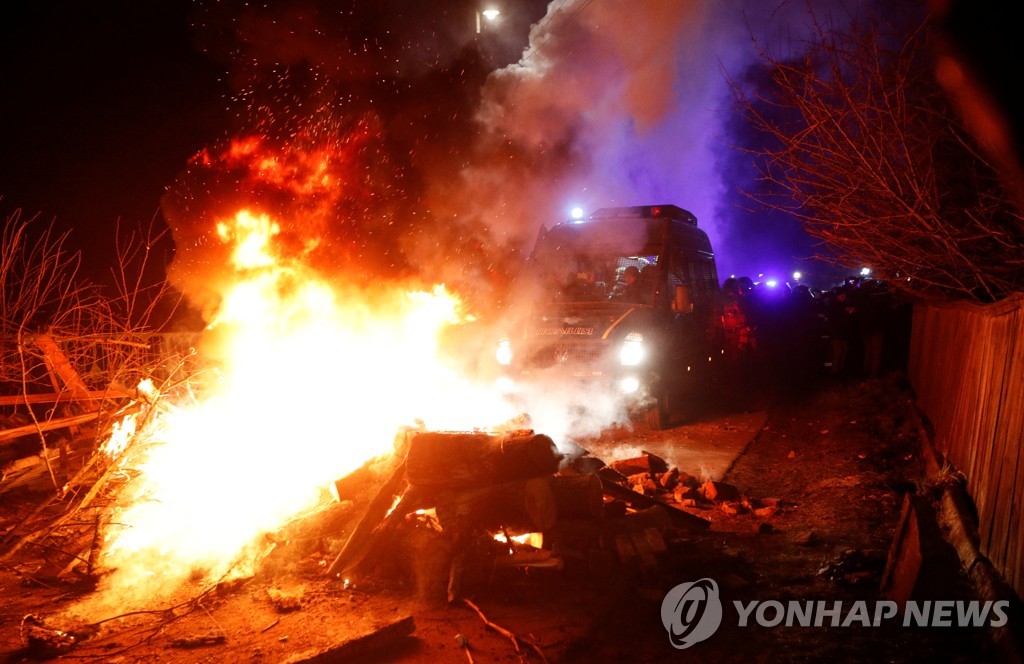 CHINA-HEALTH/UKRAINE-PROTESTS