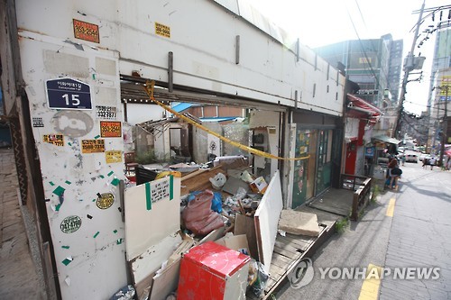 서울시내 한 폐업으로 문 닫은 상점(연합뉴스 자료사진)