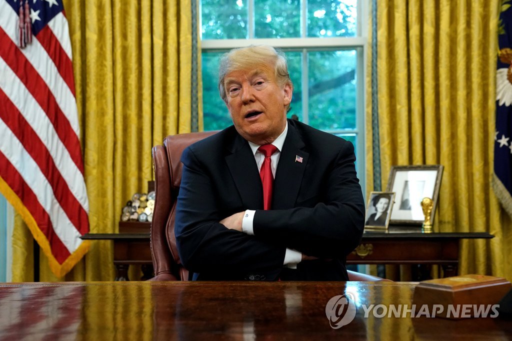 This Reuters photo shows President Donald Trump answering a reporter's qustion at the White House on Oct. 10, 2018 (Yonhap)
