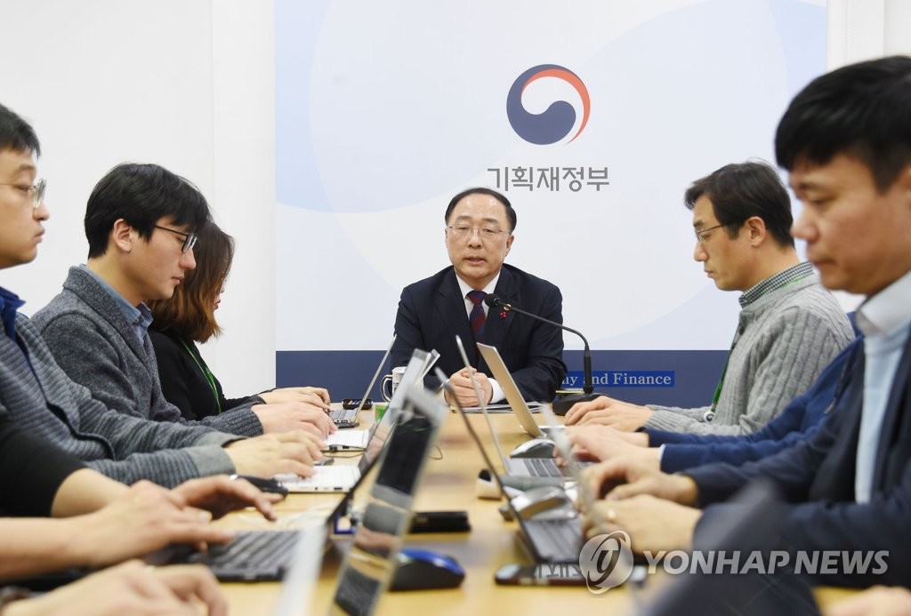 Hong Nam-ki, the minister of economy and finance, holds a meeting with reporters at the ministry building inSejong, central South Korea, on Dec. 11, 2018. This photo was provided by the Ministry of Economy and Finance. (Yonhap).