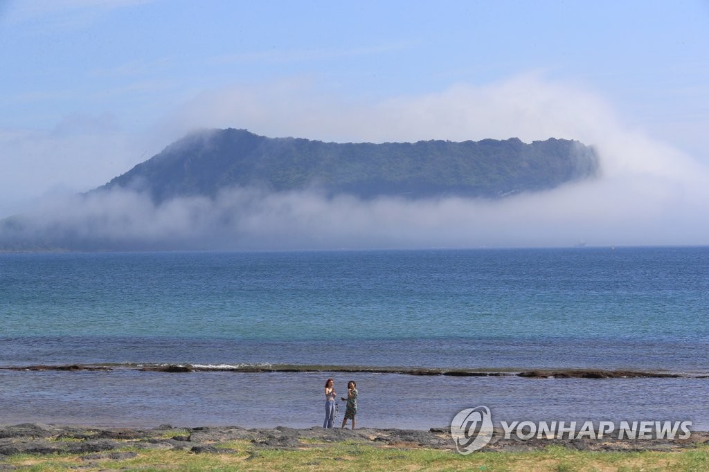 Fog-covered peak on Jeju Fog-covered peak on Jeju