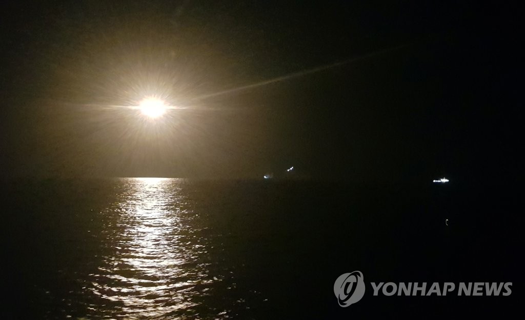 Overnight search operations are under way in waters near Dokdo on Nov. 2, 2019. (Yonhap)