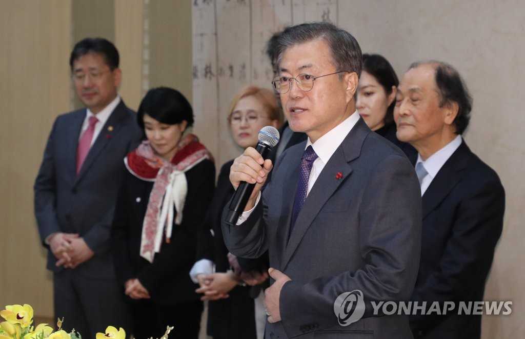 President Moon Jae-in speaks at his meeting for the new year with dozens of cultural figures and celebrities at Seoul Arts Center on Jan. 8, 2020. (Yonhap)