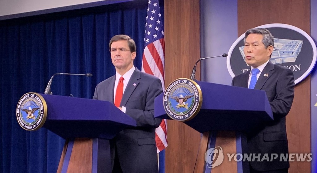 In this file photo, taken on Feb. 24, 2020, South Korean Defense Minister Jeong Kyeong-doo (R) and U.S. Defense Secretary Mark Esper hold a joint press conference at the Pentagon in Washington. (Yonhap) 