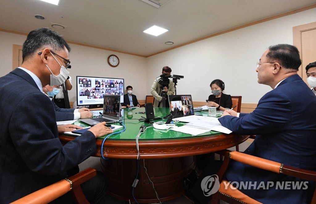 Finance Minister Hong Nam-ki (R) speaks during an annual conference of the Asian Development Bank (ADB), which is being held online, at the government complex in Seoul on Sept. 18, 2020, in this photo released by the finance ministry. (PHOTO NOT FOR SALE) (Yonhap)