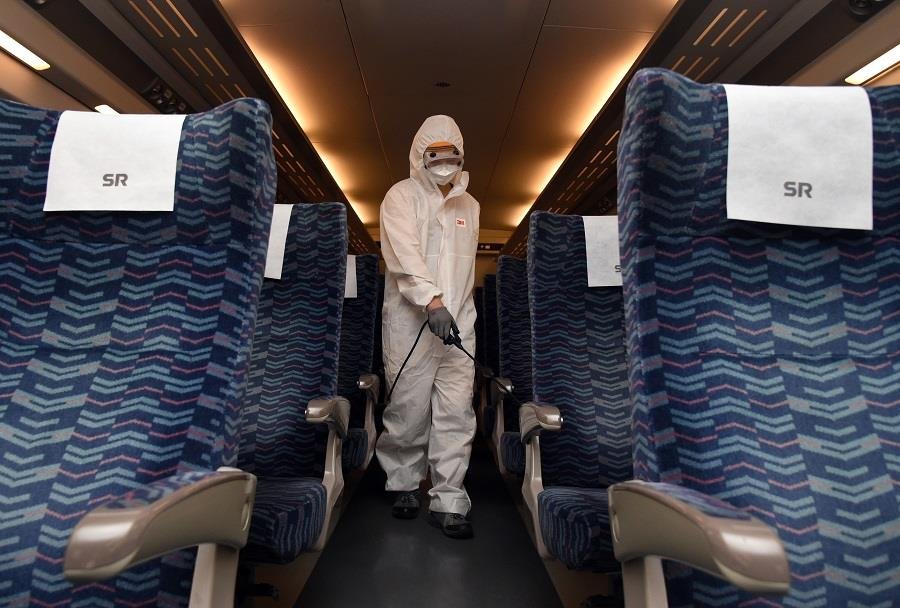 Disinfection work under way inside train Disinfection work under way inside train
