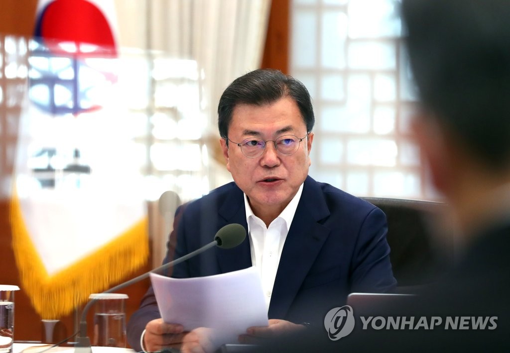 President Moon Jae-in makes opening remarks during an expanded meeting of economy-related ministers held at Cheong Wa Dae on April 15, 2021. (Yonhap)