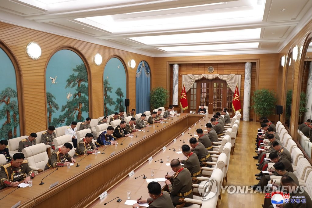 North Korean leader Kim Jong-un (C) presides over an enlarged meeting of Central Military Commission meeting of the ruling Workers' Party in Pyongyang on June 11, 2021, in this photo released by the official Korean Central News Agency the next day. (For Use Only in the Republic of Korea. No Redistribution) (Yonhap)▲▲