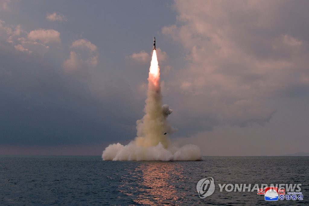 In this photo released Oct. 20, 2021 by North Korea's official Korean Central News Agency, a new type of a submarine-launched ballistic missile (SLBM) is test-fired from waters the previous day. The South Korean military said on Oct. 19 that North Korea fired what appears to be an SLBM toward the East Sea from waters east of Sinpo, a city on the North's east coast. (For Use Only in the Republic of Korea. No Redistribution) (Yonhap)