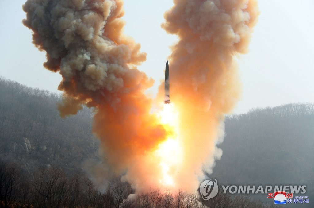 This photo, carried by North Korea's official Korean Central News Agency on March 20, 2023, shows the North conducting military drills simulating a tactical nuclear counterattack against its enemies. (For Use Only in the Republic of Korea. No Redistribution) (Yonhap)