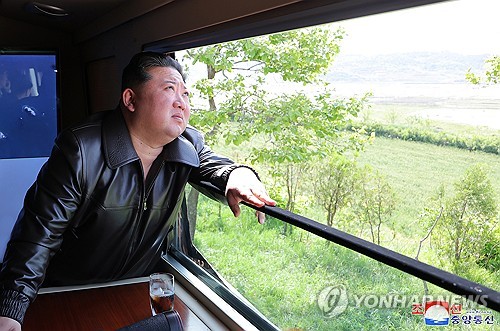 N. Korean leader oversees ballistic missile launch