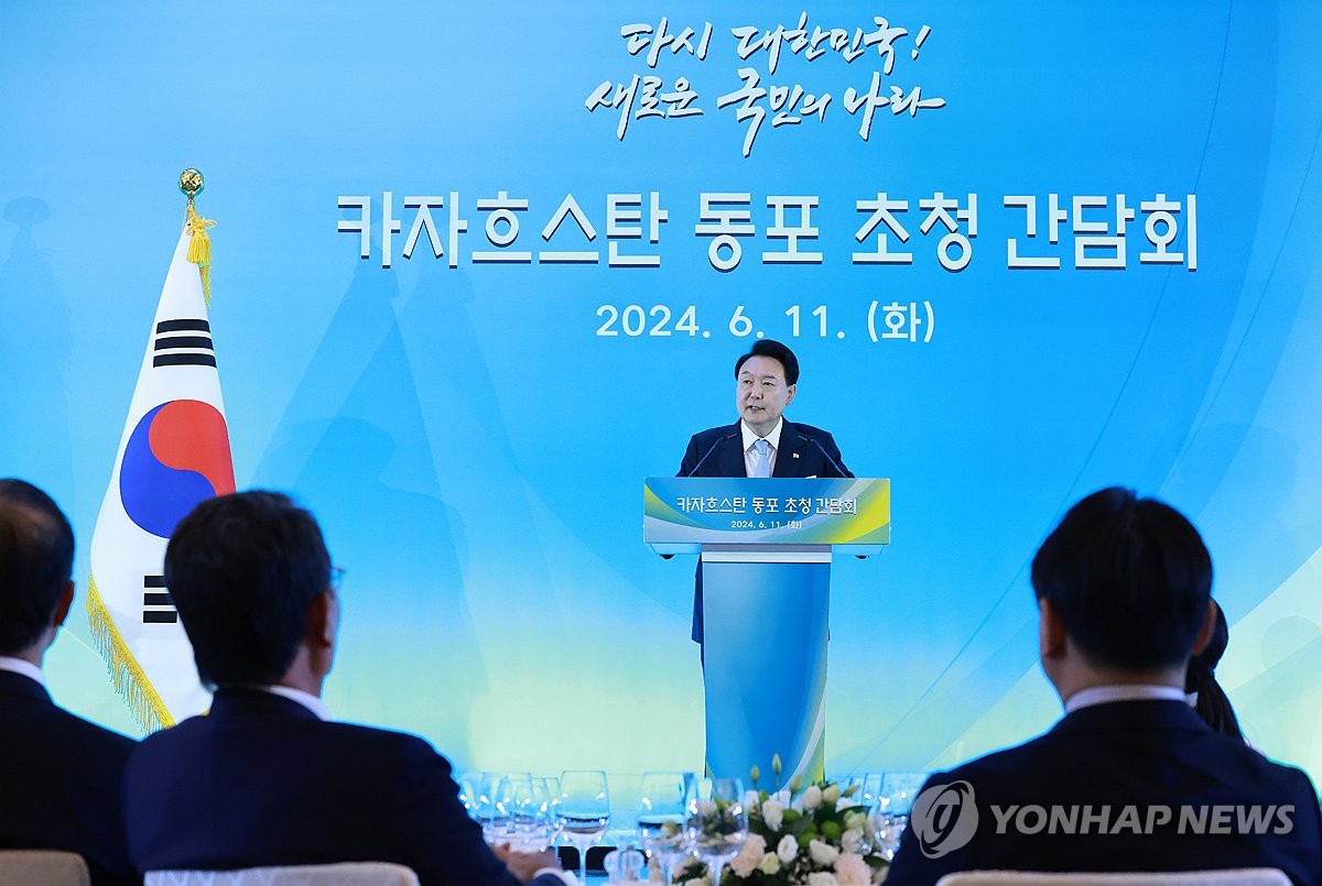 President Yoon Suk Yeol speaks during a meeting with ethnic Koreans and South Korean nationals in Kazakhstan at a hotel in Astana on June 11, 2024. (Yonhap)