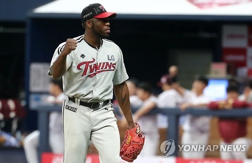Henry Sosa of the LG Twins pumps his fist after completing the sixth inning against the Nexen Heroes in their Korea Baseball Organization postseason game at Gocheok Sky Dome in Seoul on Oct. 13, 2016. (Yonhap)