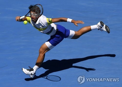 In this Associated Press photo, South Korea's Chung Hyeon hits a shot against Grigor Dimitrov of Bulgaria during their second-round match at the Australian Open at Hisense Arena in Melbourne on Jan. 19, 2017. (Yonhap)