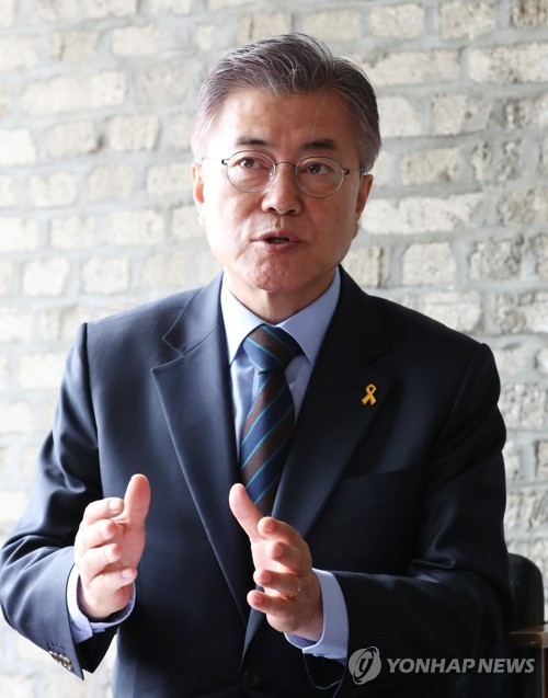 Moon Jae-in, the presidential nominee of the liberal Democratic Party, speaks in an interview with Yonhap News Agency at a Seoul cafe on April 9, 2017. (Yonhap)