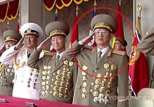 This image, captured from footage of North Korea's state-run TV station on April 15, 2017, shows Kim Won-hong, circled in red, who is known to have been dismissed from the country's office of spy chief early this year. He made his first public appearance since the alleged dismissal in mid-January at a military parade held to mark the 105th birthday of late founder Kim Il-sung. (For Use Only in the Republic of Korea. No Redistribution) (Yonhap)