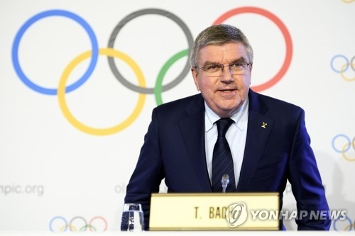 This photo taken by the EPA shows International Olympic Committee (IOC) president Thomas Bach speaking at a press conference after an executive board meeting of the IOC in Lausanne, Switzerland, on Dec. 6, 2017. (Yonhap)