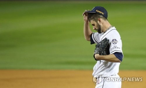 In this file photo taken on Oct. 30, 2017, Dustin Nippert of the Doosan Bears reacts after giving up a leadoff single against Lee Myung-ki of the Kia Tigers in the top of the first inning in Game 5 of the Korean Series at Jamsil Stadium in Seoul. (Yonhap)