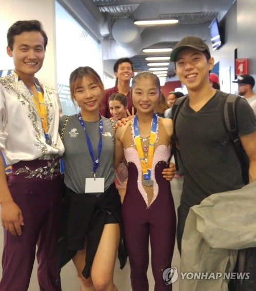 This undated file photo provided by South Korean figure skater Kim Kyu-eun shows figure skaters from South and North Korea together. From left: Kim Ju-sik of North Korea, Kim Kyu-eun of South Korea, Ryom Tae-ok of North Korea and Kam Kang-chan of South Korea. (Yonhap)